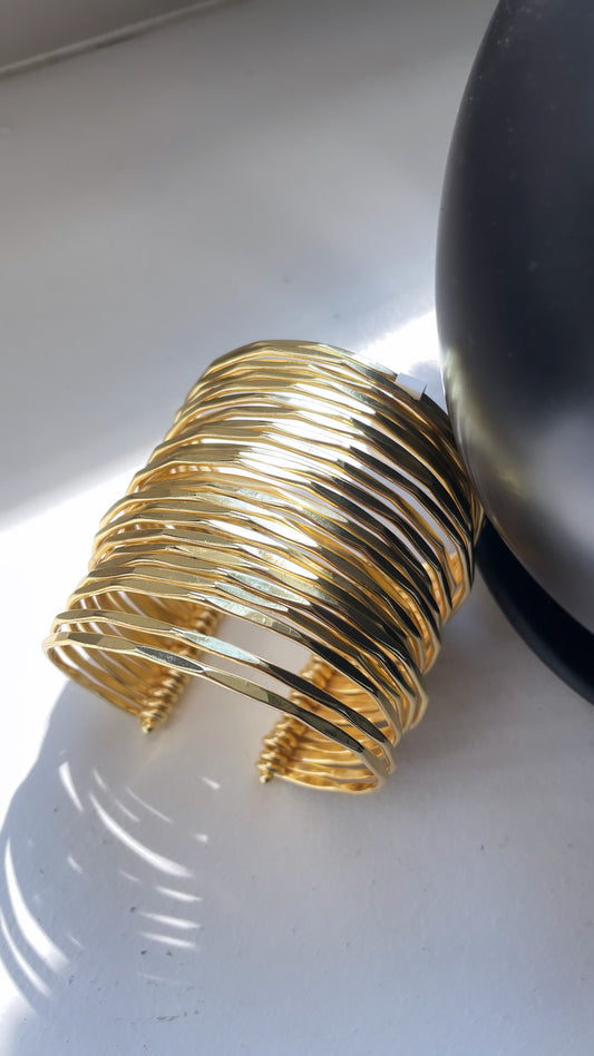 Gold cuff bracelet